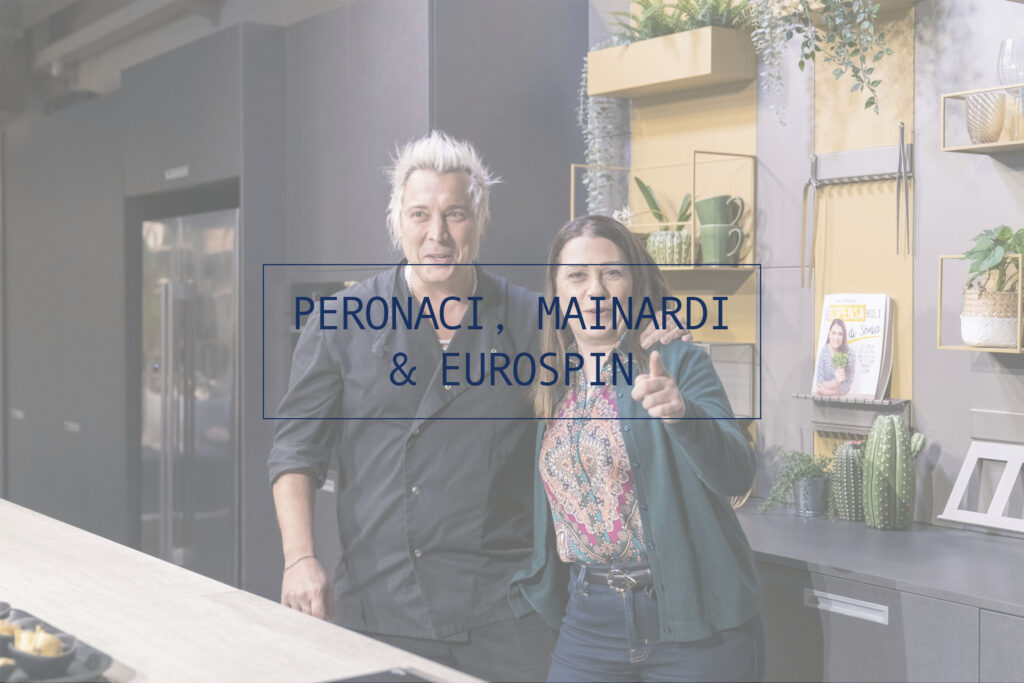 alt="servizio fotografico evento eurospin con Sonia Peronaci e Andrea Mainardi chef"